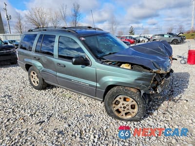 Czwarte zdjęcie samochodu z boku: 2004 JEEP GRAND CHEROKEE LAREDO VIN:1J4GW48S64C263621 - miniatura