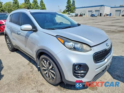Czwarte zdjęcie samochodu z boku: 2017 KIA SPORTAGE EX VIN:KNDPN3AC0H7243403 - miniatura
