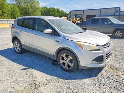 Czwarte zdjęcie samochodu z boku: 2014 FORD ESCAPE SE VIN:1FMCU0GX6EUC34563 - miniatura