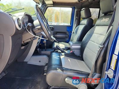 Zdjęcie 7 z 12 samochodu: 2009 JEEP WRANGLER UNLIMITED SAHARA VIN:1J8GA59199L715254 - miniatura