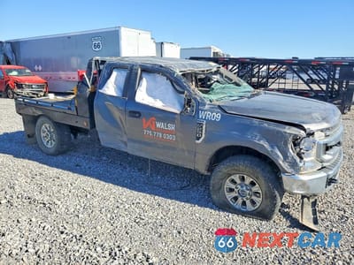 Czwarte zdjęcie samochodu z boku: 2021 FORD F250 SUPER DUTY FLATBED TRUCK VIN:1FT7X2B66MEC61407 - miniatura