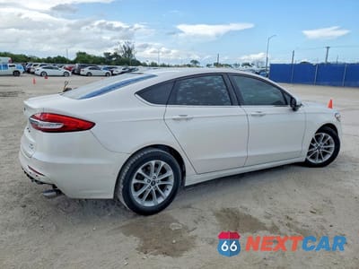 Trzecie zdjęcie samochodu z tyłu: 2020 FORD FUSION SE VIN:3FA6P0HD0LR197050 - miniatura