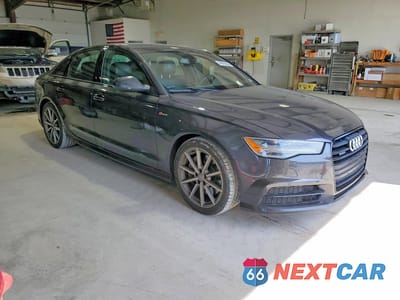 Czwarte zdjęcie samochodu z boku: 2016 AUDI A6 PREMIUM PLUS VIN:WAUFGAFC8GN024330 - miniatura