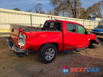 Trzecie zdjęcie samochodu z tyłu: 2016 GMC CANYON SLE VIN:1GTG6CE31G1110352 - miniatura