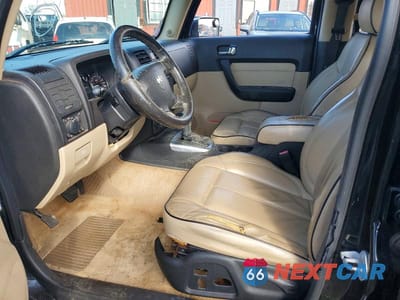 Zdjęcie 7 z 13 samochodu: 2006 HUMMER H3 VIN:5GTDN136868165984 - miniatura