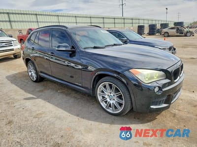Czwarte zdjęcie samochodu z boku: 2013 BMW X1 XDRIVE35I VIN:WBAVM5C54DVV91115 - miniatura