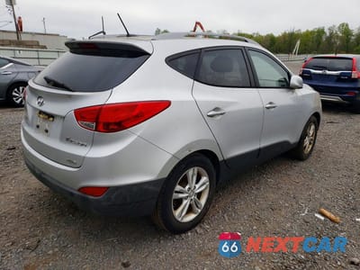 Trzecie zdjęcie samochodu z tyłu: 2010 HYUNDAI TUCSON GLS VIN:KM8JUCAC8AU046409 - miniatura