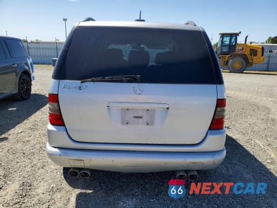 Zdjęcie 6 z 13 samochodu: 2000 MERCEDES-BENZ ML 430 VIN:4JGAB72E8YA194018 - miniatura