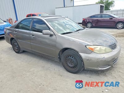 Czwarte zdjęcie samochodu z boku: 2002 TOYOTA CAMRY LE VIN:4T1BE32K22U525188 - miniatura