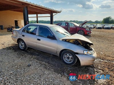 Czwarte zdjęcie samochodu z boku: 2000 TOYOTA COROLLA VE VIN:1NXBR12E2YZ373487 - miniatura
