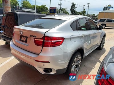 Czwarte zdjęcie samochodu z boku: 2014 BMW X6 XDRIVE35I VIN:5UXFG2C55E0C44874 - miniatura