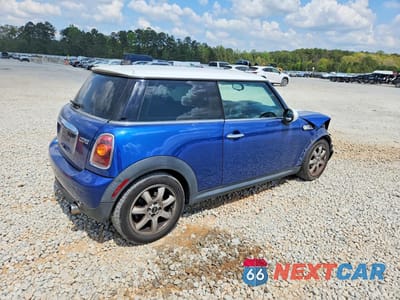 Trzecie zdjęcie samochodu z tyłu: 2009 MINI COOPER VIN:WMWMF33549TU70128 - miniatura