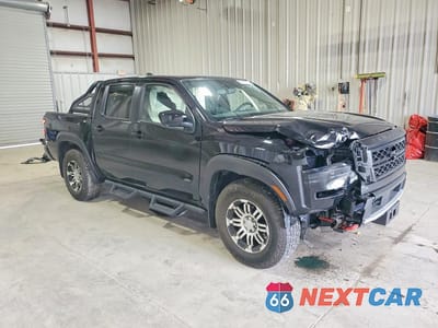 Czwarte zdjęcie samochodu z boku: 2022 NISSAN FRONTIER PRO-4X VIN:1N6ED1EK3NN674600 - miniatura