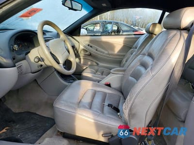 Zdjęcie 7 z 11 samochodu: 1997 FORD MUSTANG VIN:1FALP444XVF151502 - miniatura