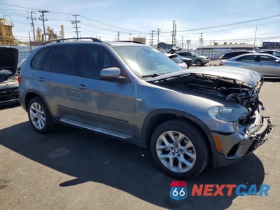 Czwarte zdjęcie samochodu z boku: 2012 BMW X5 XDRIVE35I VIN:5UXZV4C58CL765644 - miniatura