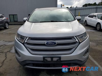 Piąte zdjęcie samochodu w środku: 2017 FORD EDGE TITANIUM VIN:2FMPK3K94HBB75394 - miniatura