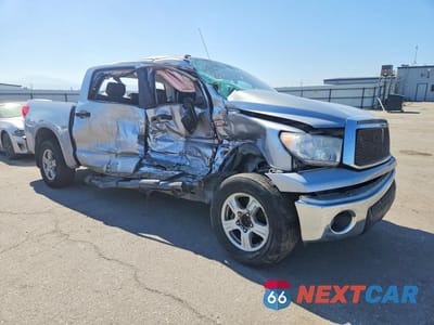 Czwarte zdjęcie samochodu z boku: 2012 TOYOTA TUNDRA CREWMAX SR5 VIN:5TFEY5F10CX117181 - miniatura