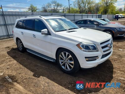 Czwarte zdjęcie samochodu z boku: 2014 MERCEDES-BENZ GL 450 4MATIC VIN:4JGDF7CE3EA308597 - miniatura