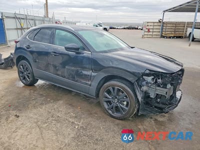 Czwarte zdjęcie samochodu z boku: 2024 MAZDA CX-30 SELECT VIN:3MVDMBBM8RM699050 - miniatura