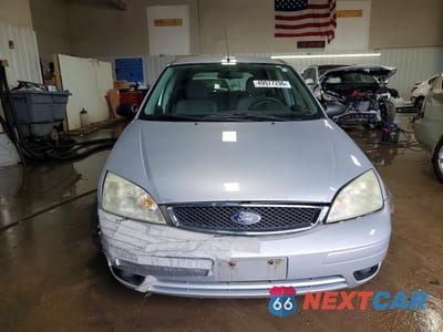 Piąte zdjęcie samochodu w środku: 2005 FORD FOCUS ZX5 VIN:3FAFP37N85R110073 - miniatura