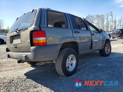 Trzecie zdjęcie samochodu z tyłu: 1998 JEEP GRAND CHEROKEE LAREDO VIN:1J4GZ58S0WC110636 - miniatura