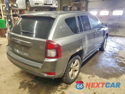 Trzecie zdjęcie samochodu z tyłu: 2012 JEEP COMPASS NORTH 4DR 4W VIN:1C4NJDAB7CD671236 - miniatura