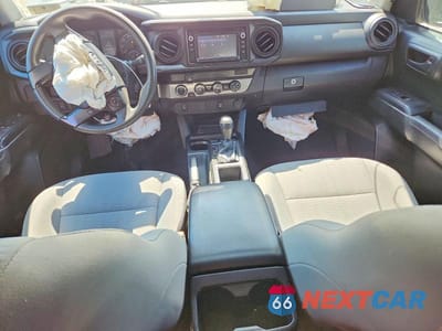 Zdjęcie 8 z 11 samochodu: 2019 TOYOTA TACOMA SR VIN:5TFSX5EN7KX068330 - miniatura