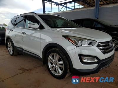 Czwarte zdjęcie samochodu z boku: 2014 HYUNDAI SANTA FE SPORT 2.0T VIN:5XYZU3LA9EG172983 - miniatura