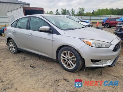 Czwarte zdjęcie samochodu z boku: 2017 FORD FOCUS SE VIN:1FADP3FE5HL238282 - miniatura