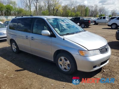 Czwarte zdjęcie samochodu z boku: 2001 HONDA ODYSSEY EX VIN:2HKRL18601H549036 - miniatura