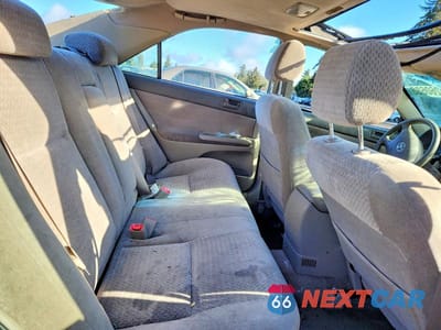 Zdjęcie 10 z 11 samochodu: 2002 TOYOTA CAMRY LE VIN:JTDBE32K220038195 - miniatura