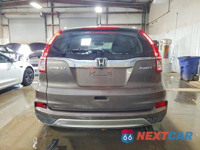 Zdjęcie 6 z 13 samochodu: 2015 HONDA CR-V EXL VIN:2HKRM4H7XFH640734 - miniatura