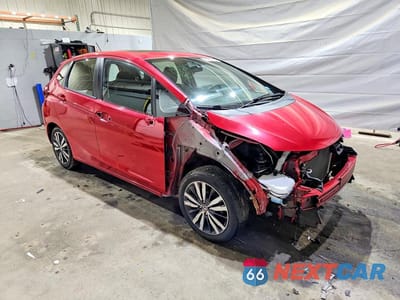 Czwarte zdjęcie samochodu z boku: 2016 HONDA FIT EX VIN:JHMGK5H74GS007666 - miniatura