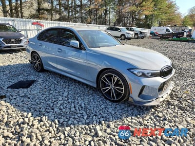 Czwarte zdjęcie samochodu z boku: 2023 BMW 330XI VIN:3MW89FF09P8D03052 - miniatura