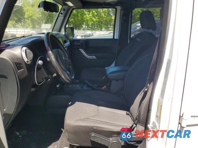 Zdjęcie 7 z 12 samochodu: 2016 JEEP WRANGLER UNLIMITED SAHARA VIN:1C4BJWEG7GL144264 - miniatura