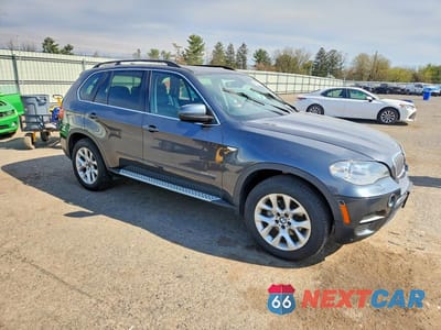 Czwarte zdjęcie samochodu z boku: 2013 BMW X5 XDRIVE35I VIN:5UXZV4C53D0B09115 - miniatura