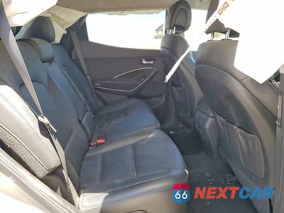 Zdjęcie 10 z 12 samochodu: 2013 HYUNDAI SANTA FE SPORT 2.0T VIN:5XYZU3LA0DG083818 - miniatura