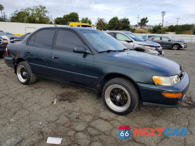 Czwarte zdjęcie samochodu z boku: 1997 TOYOTA COROLLA DX VIN:1NXBB02E5VZ588419 - miniatura