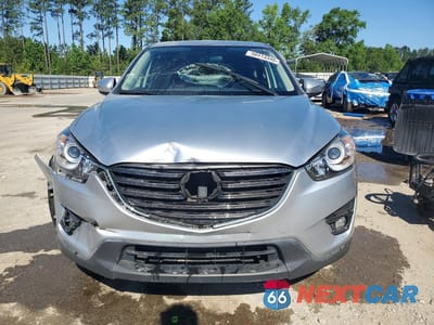 Piąte zdjęcie samochodu w środku: 2016 MAZDA CX-5 TOURING VIN:JM3KE2CY6G0864981 - miniatura