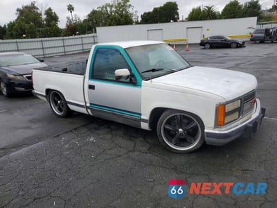 Czwarte zdjęcie samochodu z boku: 1990 GMC SIERRA C1500 VIN:1GTDC14K6LZ552872 - miniatura