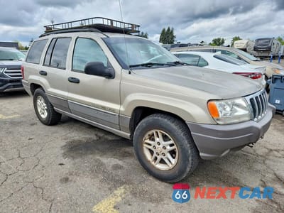 Czwarte zdjęcie samochodu z boku: 2003 JEEP GRAND CHEROKEE VIN:1J4GW48S33C509023 - miniatura