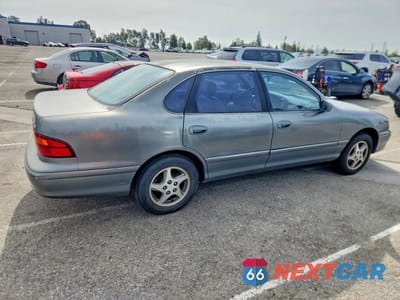 Trzecie zdjęcie samochodu z tyłu: 1999 TOYOTA AVALON XLS VIN:4T1BF18B4XU343041 - miniatura