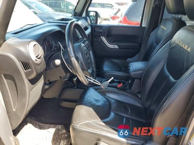 Zdjęcie 7 z 12 samochodu: 2013 JEEP WRANGLER UNLIMITED SAHARA VIN:1C4HJWEG0DL678258 - miniatura
