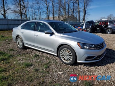 Czwarte zdjęcie samochodu z boku: 2016 VOLKSWAGEN PASSAT SE VIN:1VWBS7A36GC032915 - miniatura