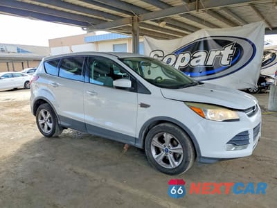 Czwarte zdjęcie samochodu z boku: 2014 FORD ESCAPE SE VIN:1FMCU0GX4EUD88706 - miniatura
