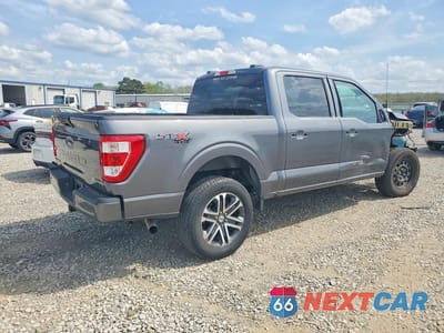 Trzecie zdjęcie samochodu z tyłu: 2023 FORD F150 SUPERCREW VIN:1FTFW1E51PKD43742 - miniatura