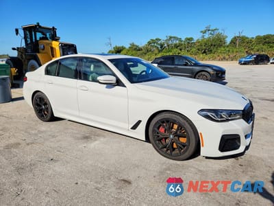 Czwarte zdjęcie samochodu z boku: 2022 BMW 540 XI VIN:WBA73BJ09NCJ90383 - miniatura