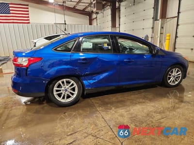 Trzecie zdjęcie samochodu z tyłu: 2018 FORD FOCUS SE VIN:1FADP3F28JL201769 - miniatura