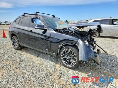 Czwarte zdjęcie samochodu z boku: 2015 BMW X1 XDRIVE35I VIN:WBAVM5C53FVV94056 - miniatura