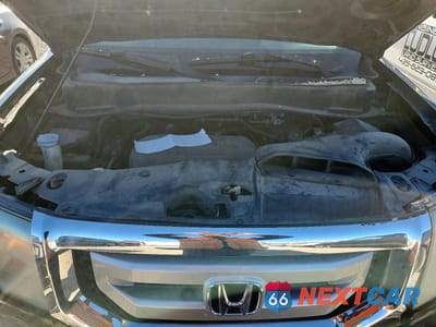 Zdjęcie 12 z 13 samochodu: 2011 HONDA PILOT EX VIN:5FNYF4H40BB034301 - miniatura